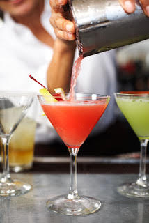Cocktail being poured at Mustards Grill
