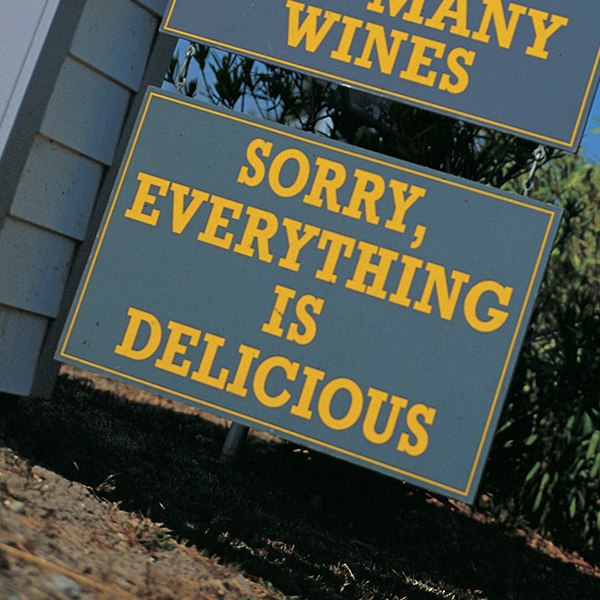 Sorry, Everything is Delicious sign at Mustards Grill